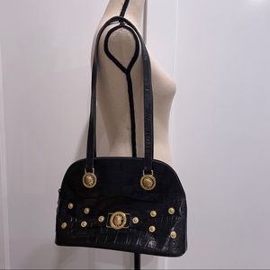 Caché vintage leather crossbody bag with delicate gold rivets